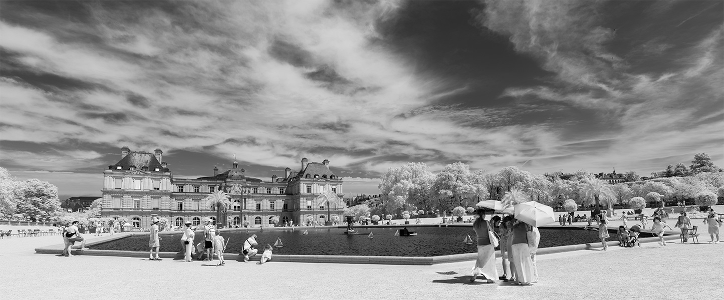 Panoramic Infrared Photo of Large Pool in Front of Renaissance Chateau with Children Sailing Model Boats.